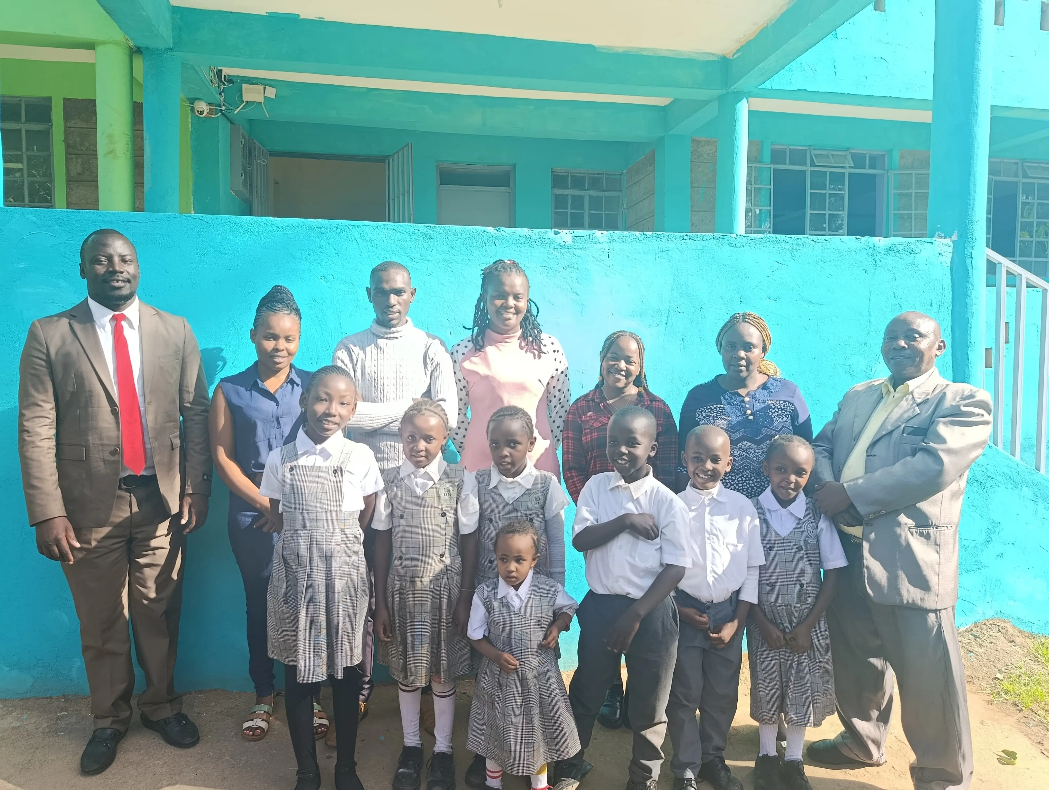 Group of school children in a photo wearing their uniforms